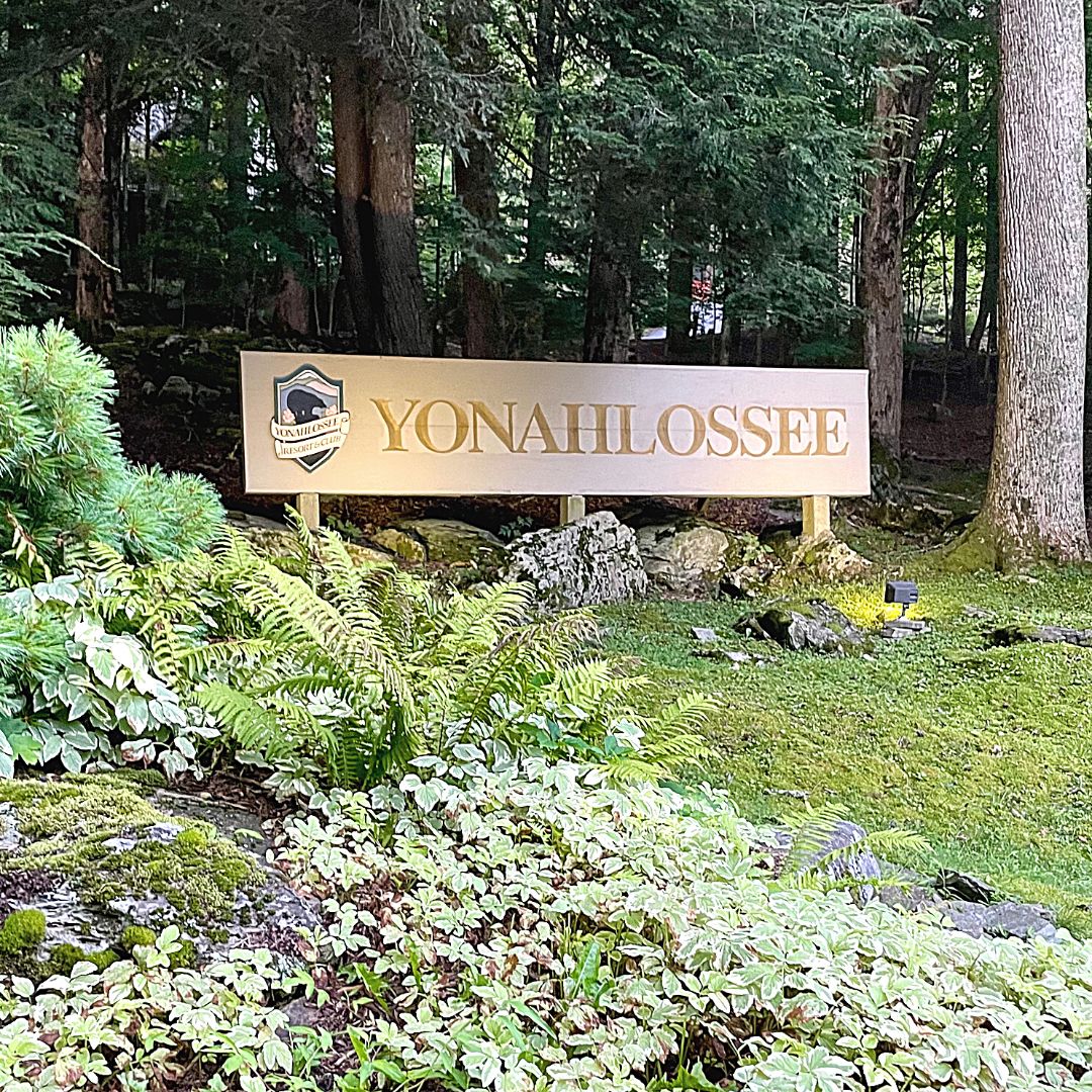 Yonahlossee Resort sign located near Boone and Blowing Rock, NC. The resort has a number of charming cabins for rent and a tennis facility.
