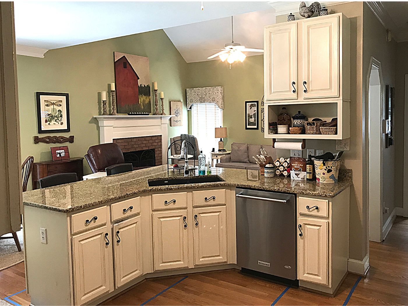 Old Kitchen L-Shaped Peninsula with Granite Countertop, Blanco Silgranite Black Sink and Soffit Space above Cabinets 9 foot ceiling