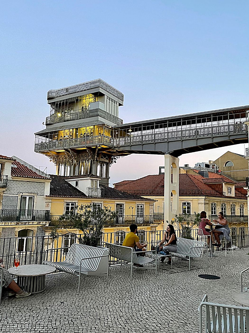 Carmo Terrace Bar at dusk with a view of the Santa Justa Lift